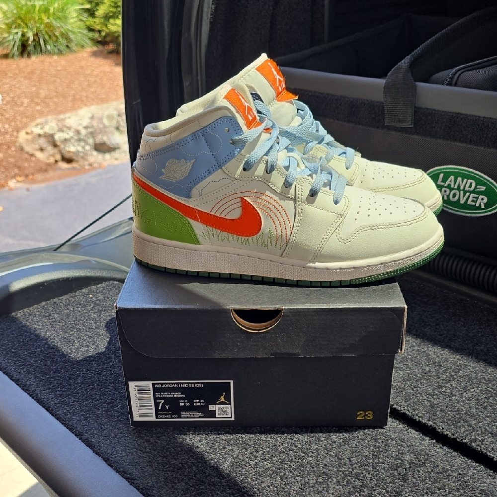 Nike Air Jordan 1 Mid SE with Orange and Green Accents